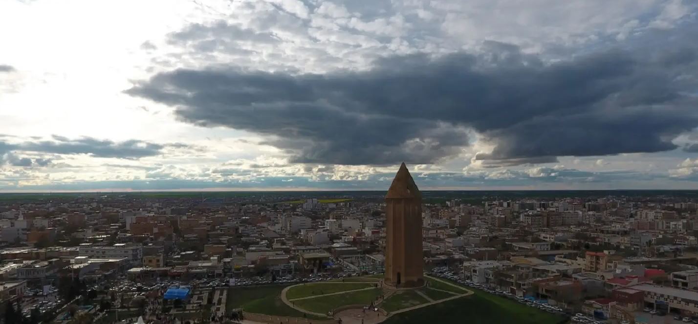 The 53 m high tomb built in ad 1006 for Qābus Ibn Voshmgir, Ziyarid ruler and literati, near the ruins of the ancient city of Jorjan in north-east Iran, bears testimony to the cultural exchange between Central Asian nomads and the ancient civilization of Iran. The tower is the only remaining evidence of Jorjan, a former centre of arts and science that was destroyed during the Mongols’ invasion in the 14th and 15th centuries. It is an outstanding and technologically innovative example of Islamic architecture that influenced sacral building in Iran, Anatolia and Central Asia. Built of unglazed fired bricks, the monument’s intricate geometric forms constitute a tapering cylinder with a diameter of 17–15.5 m, topped by a conical brick roof. It illustrates the development of mathematics and science in the Muslim world at the turn of the first millennium AD.